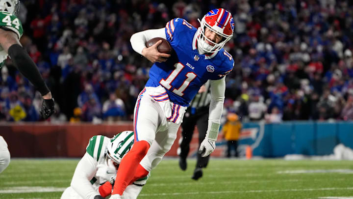 Jan 4, 2026; Orchard Park, New York, USA; Buffalo Bills quarterback Mitchell Trubisky (11) scrambles