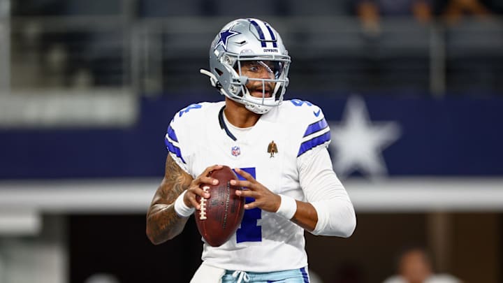 Dallas Cowboys quarterback Dak Prescott (4) warms up before the game against the Baltimore Ravens at AT&T Stadium. Dallas Cowboys quarterback Dak Prescott (4) warms up before the game against the Baltimore Ravens at AT&T Stadium.