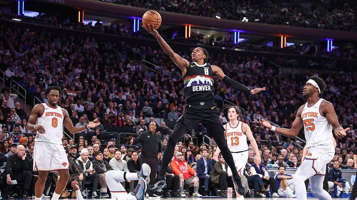 Feb 4, 2026; New York, New York, USA; Denver Nuggets guard Peyton Watson (8) drives past New York Knicks guard Jalen Brunson (11) and Ariel Hukporti (55) in the second quarter at Madison Square Garden. Mandatory Credit: Wendell Cruz-Imagn Images Feb 4, 2026; New York, New York, USA; Denver Nuggets guard Peyton Watson (8) drives past New York Knicks guard Jalen Brunson (11) and Ariel Hukporti (55) in the second quarter at Madison Square Garden. Mandatory Credit: Wendell Cruz-Imagn Images