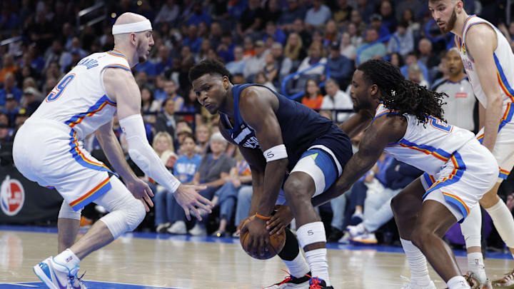 Mar 15, 2026; Oklahoma City, Oklahoma, USA; Oklahoma City Thunder guard Cason Wallace (22) reaches to steal the ball away from Minnesota Timberwolves guard Anthony Edwards (5) during the second half at Paycom Center. Mar 15, 2026; Oklahoma City, Oklahoma, USA; Oklahoma City Thunder guard Cason Wallace (22) reaches to steal the ball away from Minnesota Timberwolves guard Anthony Edwards (5) during the second half at Paycom Center.