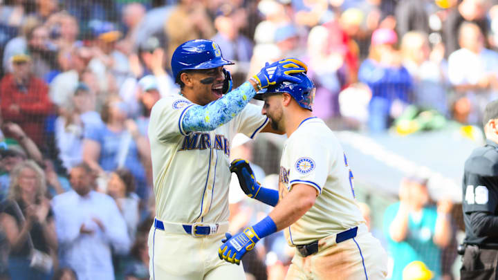 Seattle Mariners center fielder Julio Rodriguez (44) and catcher Cal Raleigh (29) celebrate after Raleigh hit a 2-run home run during the fifth inning at T-Mobile Park on Sept 29. Seattle Mariners center fielder Julio Rodriguez (44) and catcher Cal Raleigh (29) celebrate after Raleigh hit a 2-run home run during the fifth inning at T-Mobile Park on Sept 29.