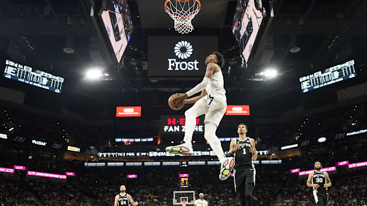 Denver Nuggets forward Peyton Watson (8) dunks during the second half against the San Antonio Spurs at Frost Bank Center. 