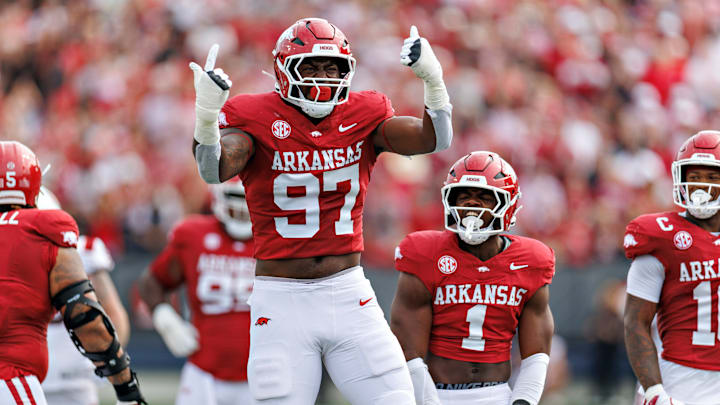 Arkansas Razorback junior defensive end Quincy Rhodes celebrates during Arkansas' 56-14 win over the Arkansas State Red Wolves at War Memorial Stadium.