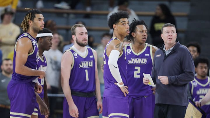 Jan 6, 2024; Hattiesburg, Mississippi, USA; James Madison Dukes head coach Mark Byington, right, and