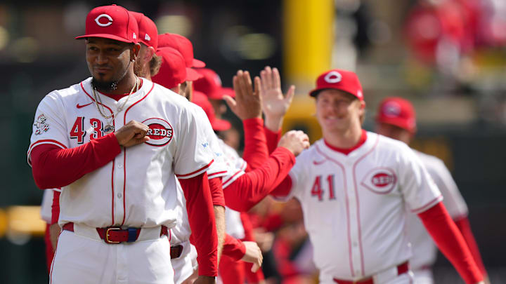 Cincinnati Reds relief pitcher Alexis Diaz (43) gestures toward the Washington Nationals dugout during team introduction before a baseball game between the Washington Nationals and the Cincinnati Reds on Opening Day, Thursday, March 28, 2024, at Great American Ball Park in Cincinnati.