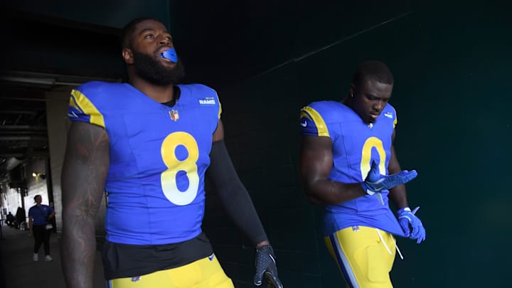 Sep 21, 2025; Philadelphia, Pennsylvania, USA; Los Angeles Rams linebacker Jared Verse (8) and linebacker Byron Young (0) wait in the tunnel against the Philadelphia Eagles at Lincoln Financial Field. Mandatory Credit: Eric Hartline-Imagn Images