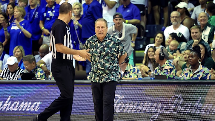 Nov 26, 2024; Lahaina, Hawaii, USA;  Michigan State Spartans head coach Tom Izzo talks to a referee during the first half against the Memphis Tigers at Lahaina Civic Center. Mandatory Credit: Marco Garcia-Imagn Images