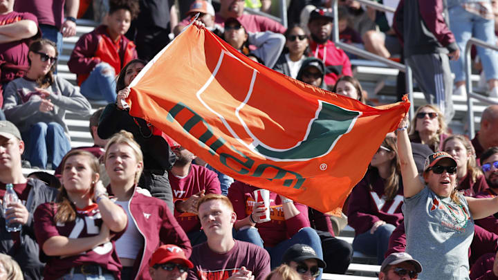 Oct 15, 2022; Blacksburg, Virginia, USA;  Miami Hurricanes fans cheer during the second half against