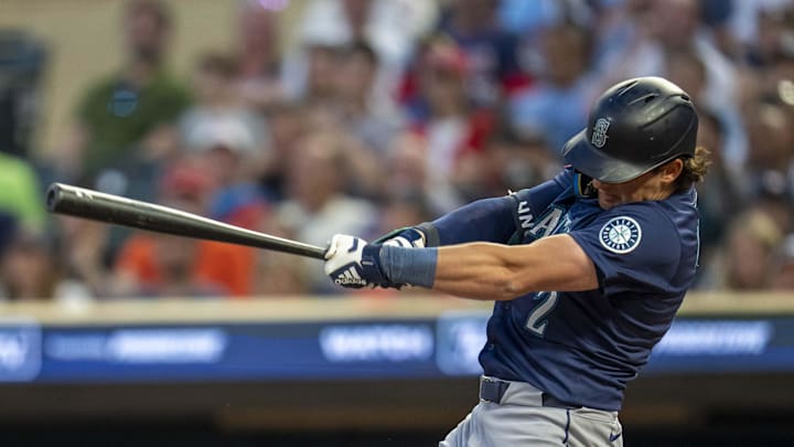 Seattle Mariners second baseman Cole Young (2) hits a single against the Minnesota Twins in the ninth inning at Target Field on June 24. 