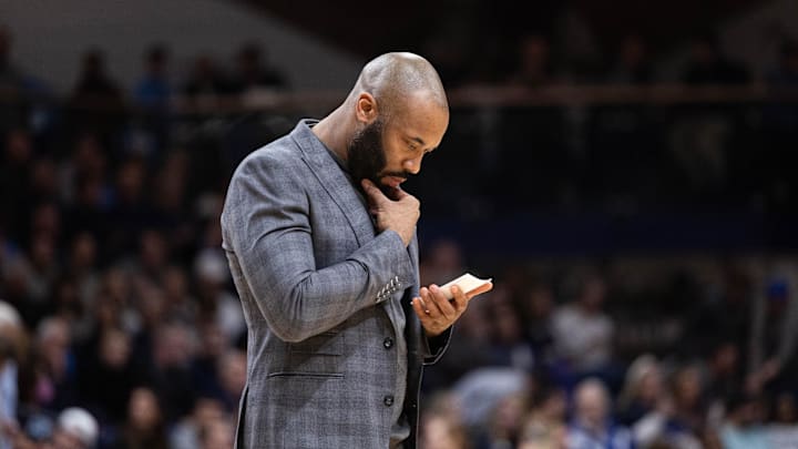 Feb 20, 2024; Villanova, Pennsylvania, USA; Villanova Wildcats head coach Kyle Neptune looks at his lineup card.