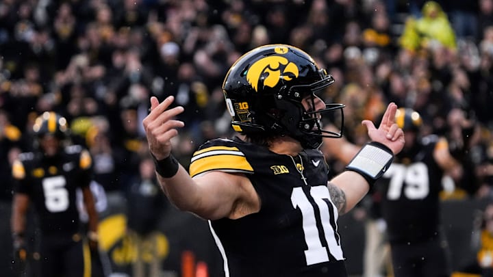 Iowa Hawkeyes quarterback Jeremy Hecklinski (10) celebrates after scoring a touchdown against the Minnesota Golden Gophers Oct. 25, 2025 at Kinnick Stadium in Iowa City, Iowa.