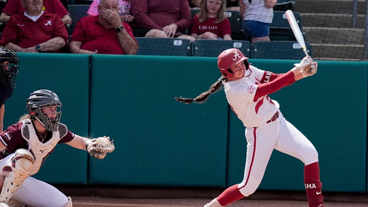 Mar 14, 2025; Tuscaloosa AL, USA; Alabama opened the SEC season on the wrong end of a 9-1 score against Mississippi State at Rhoads Stadium. Kali Heivilin (22) slaps a hit to right field. Mar 14, 2025; Tuscaloosa AL, USA; Alabama opened the SEC season on the wrong end of a 9-1 score against Mississippi State at Rhoads Stadium. Kali Heivilin (22) slaps a hit to right field.