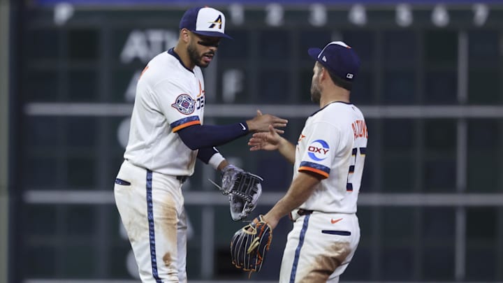 Houston Astros shortstop Carlos Correa and second baseman Jose Altuve celebrate. 