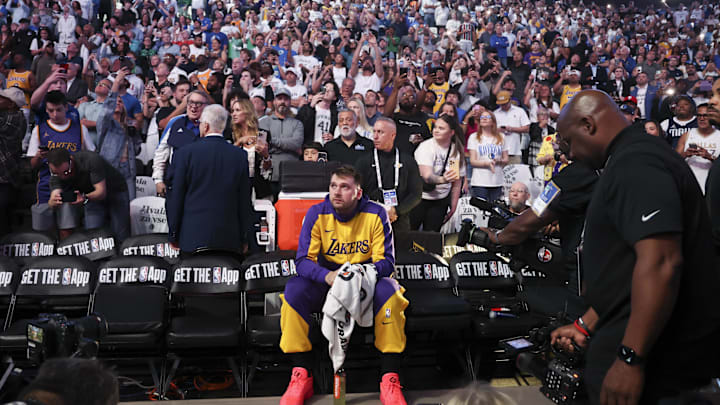 Apr 9, 2025; Dallas, Texas, USA;  Los Angeles Lakers guard Luka Doncic (77) reacts while watching a tribute video before the game against the Dallas Mavericks at American Airlines Center. Mandatory Credit: Kevin Jairaj-Imagn Images