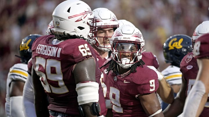 Sep 21, 2024; Tallahassee, Florida, USA; Florida State Seminoles running back Lawrance Toafili (9) celebrates a touchdown run during the first half against the California Golden Bears at Doak S. Campbell Stadium. Mandatory Credit: Melina Myers-Imagn Images