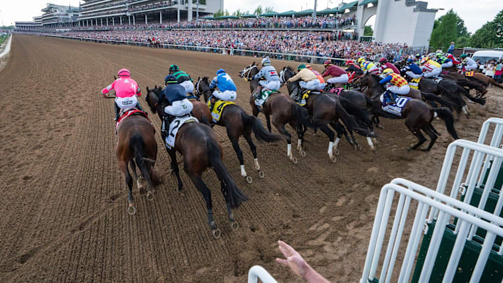 The field of horses rush out of the starting gate Saturday, May 4, 2024, during of the 150th running of the Kentucky Derby at Churchill Downs in Louisville, Kentucky.
