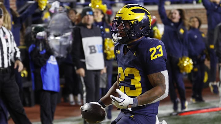 Nov 1, 2025; Ann Arbor, Michigan, USA;  Michigan Wolverines running back Jordan Marshall (23) rushes for a touchdown in the second half against the Purdue Boilermakers at Michigan Stadium. Mandatory Credit: Rick Osentoski-Imagn Images