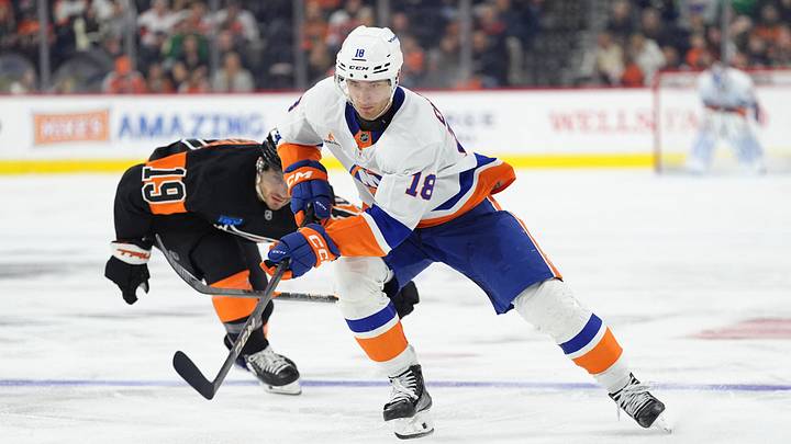 Apr 12, 2025; Philadelphia, Pennsylvania, USA; New York Islanders left wing Pierre Engvall (18) controls the puck against the Philadelphia Flyers in the third period at Wells Fargo Center. Mandatory Credit: Kyle Ross-Imagn Images