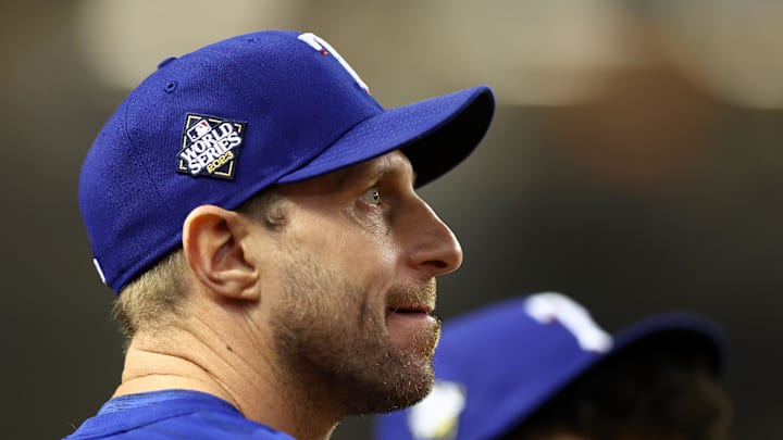 Oct 31, 2023; Phoenix, Arizona, USA; Texas Rangers injured pitcher Max Scherzer (31) watches the