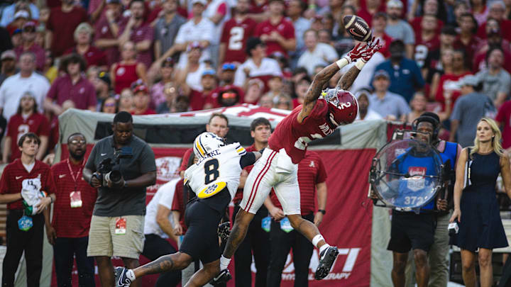 Oct 26, 2024; Tuscaloosa, Alabama, USA; Alabama Crimson Tide wide receiver Ryan Williams (2) cannot catch a pass against Missouri Tigers cornerback Marcus Clarke (8) during the third quarter at Bryant-Denny Stadium. Mandatory Credit: Will McLelland-Imagn Images