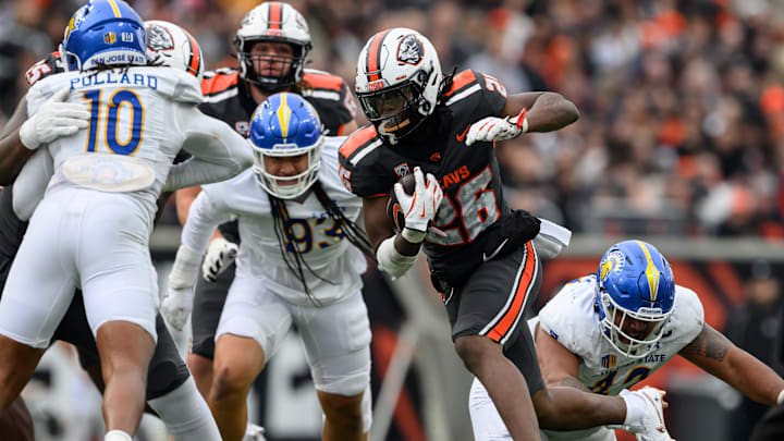 Nov 9, 2024; Corvallis, Oregon, USA; Oregon State Beavers running back Salahadin Allah (26) runs the ball against the San Jose State Spartans during the third quarter at Reser Stadium. Mandatory Credit: Craig Strobeck-Imagn Images