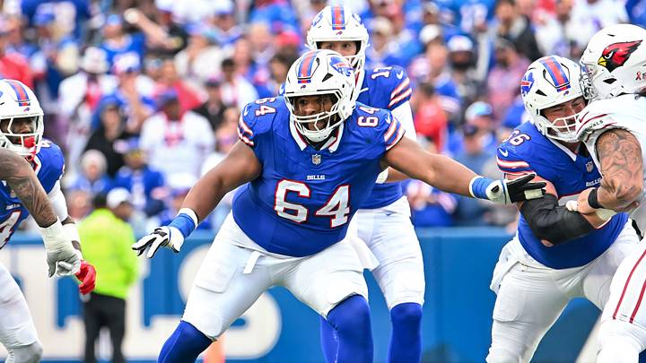 Sep. 8, 2024; Orchard Park, New York, USA; Buffalo Bills guard O'Cyrus Torrence (64) blocks against the Arizona Cardinals in the third quarter of an NFL game at the old Highmark Stadium. Mandatory Credit: Mark Konezny-Imagn Images Sep. 8, 2024; Orchard Park, New York, USA; Buffalo Bills guard O'Cyrus Torrence (64) blocks against the Arizona Cardinals in the third quarter of an NFL game at the old Highmark Stadium. Mandatory Credit: Mark Konezny-Imagn Images