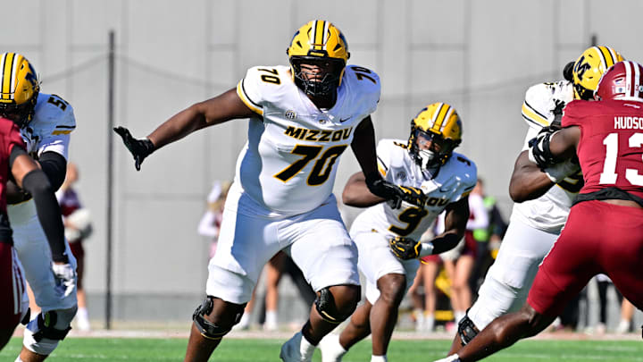 Oct 12, 2024; Amherst, Massachusetts, USA; Missouri Tigers offensive lineman Cayden Green (70) in action during the second half against the Massachusetts Minutemen at Warren McGuirk Alumni Stadium. Mandatory Credit: Eric Canha-Imagn Images
