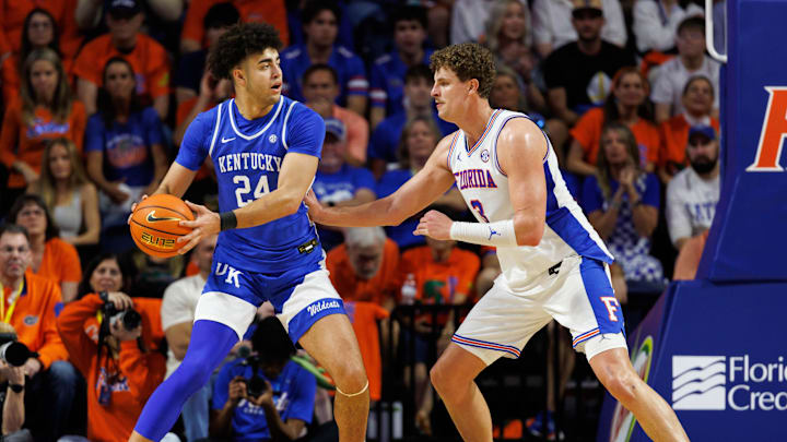 Feb 14, 2026; Gainesville, Florida, USA; Kentucky Wildcats center Malachi Moreno (24) posts up against Florida Gators center Micah Handlogten (3) during the second half at Exactech Arena at the Stephen C. O'Connell Center. Mandatory Credit: Matt Pendleton-Imagn Images