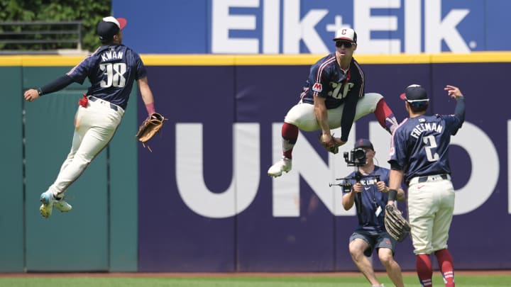 Jun 20, 2024; Cleveland, Ohio, USA; Cleveland Guardians left fielder Steven Kwan (38) and right fielder Will Brennan (17) and center fielder Tyler Freeman (2) celebrate after the Guardians beat the Seattle Mariners at Progressive Field. Mandatory Credit: Ken Blaze-USA TODAY Sports