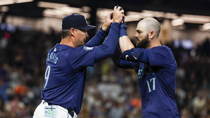 Seattle Mariners right fielder Mitch Haniger (17) celebrates manager Scott Servais (9) after hitting a walk-off three-run double against the Detroit Tigers during the ninth inning at T-Mobile Park on Aug 8. Seattle Mariners right fielder Mitch Haniger (17) celebrates manager Scott Servais (9) after hitting a walk-off three-run double against the Detroit Tigers during the ninth inning at T-Mobile Park on Aug 8.