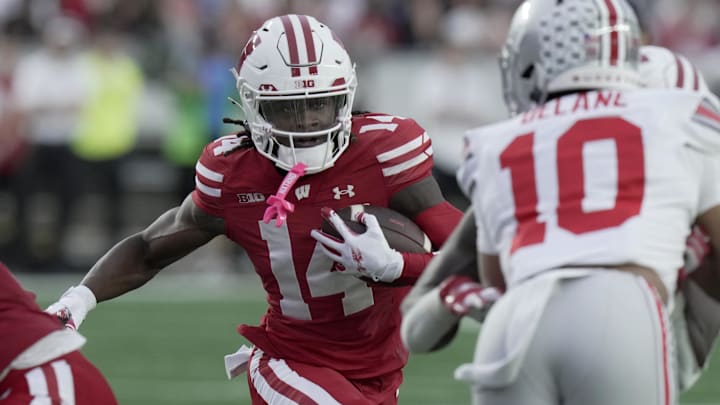Wisconsin wide receiver Dekel Crowdus (14) put up some eye-popping numbers at the Badgers Pro Day