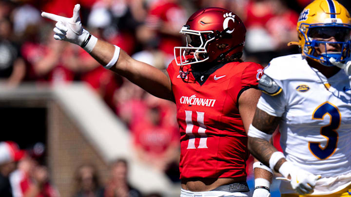 Cincinnati Bearcats tight end Joe Royer (11) reacts to getting a first down in the first quarter of the College Football game between the Cincinnati Bearcats and the Pittsburgh Panthers at Nippert Stadium in Cincinnati on Saturday, Sept. 7, 2024. Cincinnati Bearcats tight end Joe Royer (11) reacts to getting a first down in the first quarter of the College Football game between the Cincinnati Bearcats and the Pittsburgh Panthers at Nippert Stadium in Cincinnati on Saturday, Sept. 7, 2024.