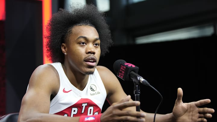 Sep 30, 2024; Toronto, Ontario, Canada; Toronto Raptors forward Scottie Barnes (4) talks to the media during media day at Scotiabank Area. Mandatory Credit: John E. Sokolowski-Imagn Images