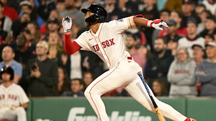 Jun 9, 2025; Boston, Massachusetts, USA; Boston Red Sox second baseman Kristian Campbell (28) hits a RBI against the Tampa Bay Rays during the ninth inning at Fenway Park. Mandatory Credit: Brian Fluharty-Imagn Images
