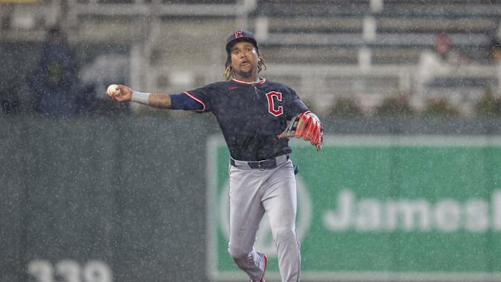 May 19, 2025; Minneapolis, Minnesota, USA; Cleveland Guardians third baseman Jose Ramirez (11) throws the ball to first base for an out against the Minnesota Twins in the third inning at Target Field. Mandatory Credit: Jesse Johnson-Imagn Images