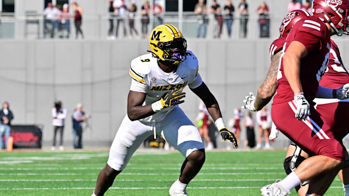 Oct 12, 2024; Amherst, Massachusetts, USA; Missouri Tigers defensive end Zion Young (9) in action against the Massachusetts Minutemen during the second half at Warren McGuirk Alumni Stadium. Mandatory Credit: Eric Canha-Imagn Images