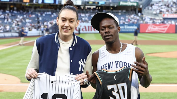 May 18, 2025; Bronx, New York, USA;  New York Liberty forward Breanna Stewart poses with New York Yankees infielder Jazz Chisolm Jr. (13) prior to the game against the New York Mets at Yankee Stadium. Mandatory Credit: Wendell Cruz-Imagn Images