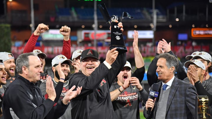 Oct 24, 2023; Philadelphia, Pennsylvania, USA; Arizona Diamondbacks owner Ken Kendrick holds the Warren C. Giles Trophy in celebration of a National League Championship at Citizen's Bank Park.