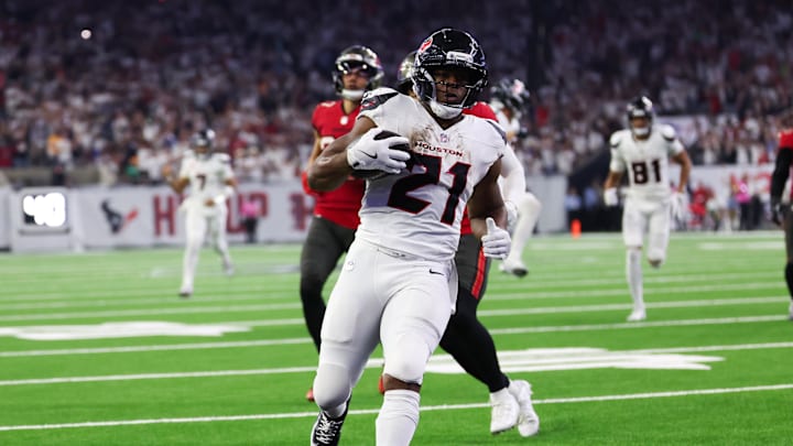 Sep 15, 2025; Houston, Texas, USA; Houston Texans running back Nick Chubb (21) rushes the ball for a touchdown during the fourth quarter against the Tampa Bay Buccaneers at NRG Stadium. Mandatory Credit: Thomas Shea-Imagn Images