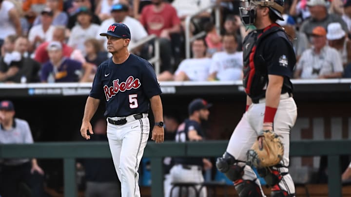 Jun 18, 2022; Omaha, NE, USA; Ole Miss Rebels head coach Mike Bianco walks to the mound in the eighth inning against the Auburn Tigers at Charles Schwab Field. Mandatory Credit: Steven Branscombe-Imagn Images Jun 18, 2022; Omaha, NE, USA; Ole Miss Rebels head coach Mike Bianco walks to the mound in the eighth inning against the Auburn Tigers at Charles Schwab Field. Mandatory Credit: Steven Branscombe-Imagn Images