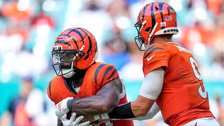 Cincinnati Bengals quarterback Joe Burrow (9) hands off to running back Samaje Perine (34) in the fourth quarter of the NFL Week 5 game between the Miami Dolphins and the Cincinnati Bengals at Hard Rock Stadium in Miami Gardens, Florida, on Sunday, Oct. 11, 2026. The Bengals improved to 3-2 on the season with a 31-24 win on the road. Cincinnati Bengals quarterback Joe Burrow (9) hands off to running back Samaje Perine (34) in the fourth quarter of the NFL Week 5 game between the Miami Dolphins and the Cincinnati Bengals at Hard Rock Stadium in Miami Gardens, Florida, on Sunday, Oct. 11, 2026. The Bengals improved to 3-2 on the season with a 31-24 win on the road.