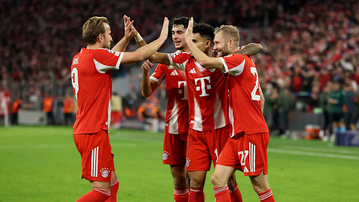 Bayern Munich players celebrating a goal against Club Brugge.