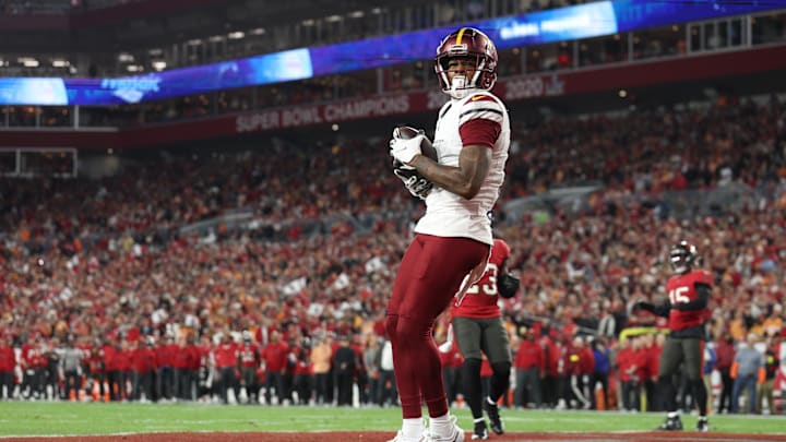 Jan 12, 2025; Tampa, Florida, USA; Washington Commanders wide receiver Dyami Brown (2) catches a touchdown during the second quarter of a NFC wild card playoff against the Tampa Bay Buccaneers at Raymond James Stadium. Mandatory Credit: Nathan Ray Seebeck-Imagn Images Jan 12, 2025; Tampa, Florida, USA; Washington Commanders wide receiver Dyami Brown (2) catches a touchdown during the second quarter of a NFC wild card playoff against the Tampa Bay Buccaneers at Raymond James Stadium. Mandatory Credit: Nathan Ray Seebeck-Imagn Images
