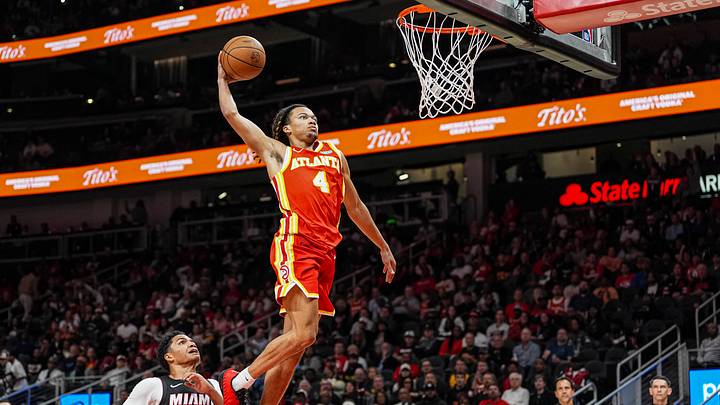 Oct 28, 2026; Atlanta, Georgia, USA; Atlanta Hawks guard Kingston Flemings (4) dunks the ball against the Miami Heat during the second half at State Farm Arena. Mandatory Credit: Dale Zanine-Imagn Images Oct 28, 2026; Atlanta, Georgia, USA; Atlanta Hawks guard Kingston Flemings (4) dunks the ball against the Miami Heat during the second half at State Farm Arena. Mandatory Credit: Dale Zanine-Imagn Images