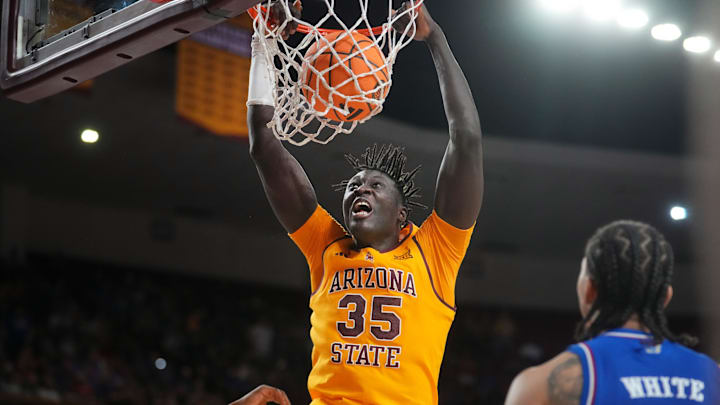 ASU Sun Devils center Massamba Diop (35) dunks the ball against the Kansas Jayhawks at Desert Financial Arena in Tempe on March 3, 2026.