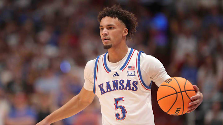 Kansas Jayhawks guard Zeke Mayo (5) looks for a pass in the first half of the game inside Allen Fieldhouse Tuesday, Oct. 29, 2024.