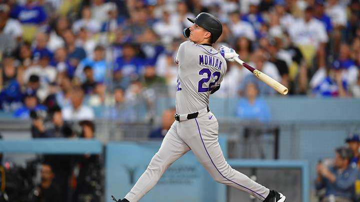 Jul 8, 2026; Los Angeles, California, USA; Colorado Rockies left fielder Mickey Moniak (22) hits a sacrifice fly ball in the third inning against the Los Angeles Dodgers at Dodger Stadium. Mandatory Credit: Gary A. Vasquez-Imagn Images Jul 8, 2026; Los Angeles, California, USA; Colorado Rockies left fielder Mickey Moniak (22) hits a sacrifice fly ball in the third inning against the Los Angeles Dodgers at Dodger Stadium. Mandatory Credit: Gary A. Vasquez-Imagn Images