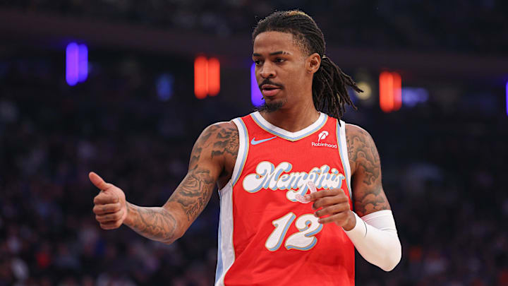 Jan 27, 2025; New York, New York, USA; Memphis Grizzlies guard Ja Morant (12) reacts during the first half against the New York Knicks at Madison Square Garden. Mandatory Credit: Vincent Carchietta-Imagn Images