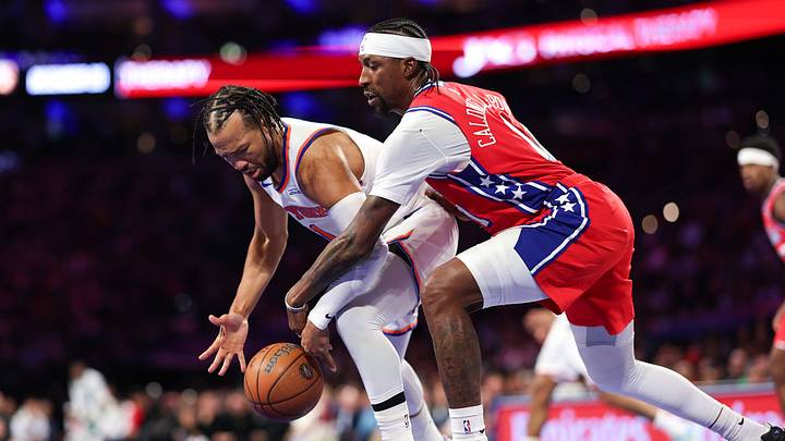 Oct 30, 2026; Philadelphia, Pennsylvania, USA; New York Knicks guard Jalen Brunson (11) looses control of the ball in front of Philadelphia 76ers guard Kentavious Caldwell-Pope (1) during the second quarter at Xfinity Mobile Arena. Mandatory Credit: Bill Streicher-Imagn Images