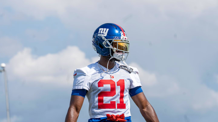New York Giants cornerback Paulson Adebo (21) warms up during day one of the New York Giants training camp at Quest Diagnostics Giants Training Center in East Rutherford on Wednesday, July 23, 2025. New York Giants cornerback Paulson Adebo (21) warms up during day one of the New York Giants training camp at Quest Diagnostics Giants Training Center in East Rutherford on Wednesday, July 23, 2025.